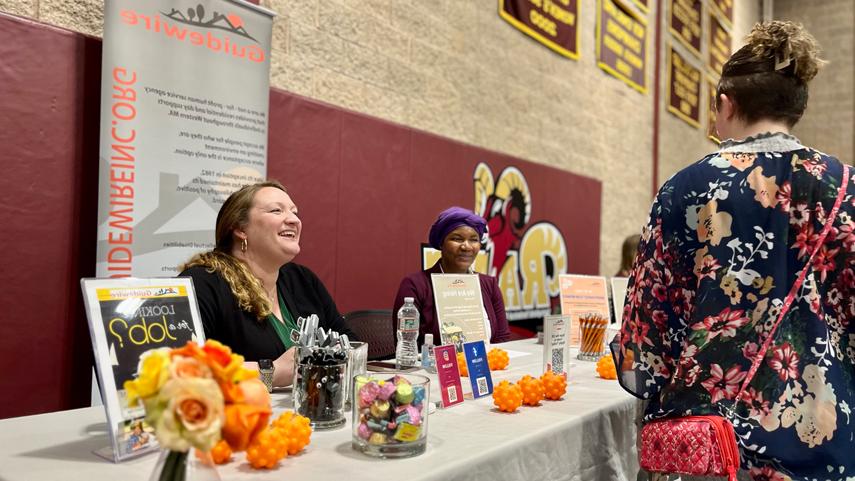 employer at career fair table